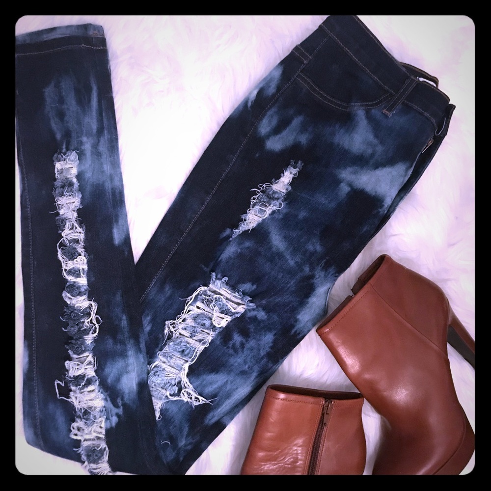 Super high waist distressed ripped skinny jeans.